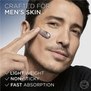 Man applying cream to his face with text highlighting features on a gray background