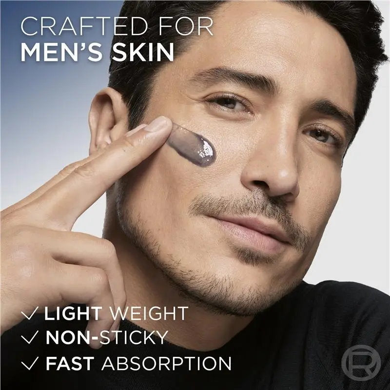 Man applying cream to his face with text highlighting features on a gray background