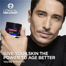 L'Oreal Men Expert skincare product with a man holding it, featuring text about skin care.