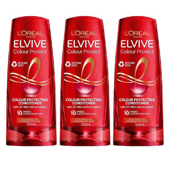 Three bottles of L'Oreal Elvive Colour Protect conditioner on a white background