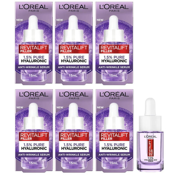 Six boxes and one bottle of L'Oreal Revitalift Filler serum on a white background