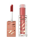 Maybelline lip gloss with applicator and packaging on a white background