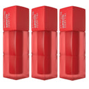 Three red lip tint bottles with Maybelline branding on a white background
