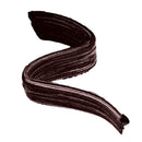 A thick, swirled cosmetic brush stroke in a very dark brown or near-black shade on a plain white background.