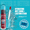 NYX Lip IV lip stain with water splash on a blue background