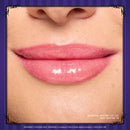 Close-up of a person's lips with a purple border and text at the bottom.