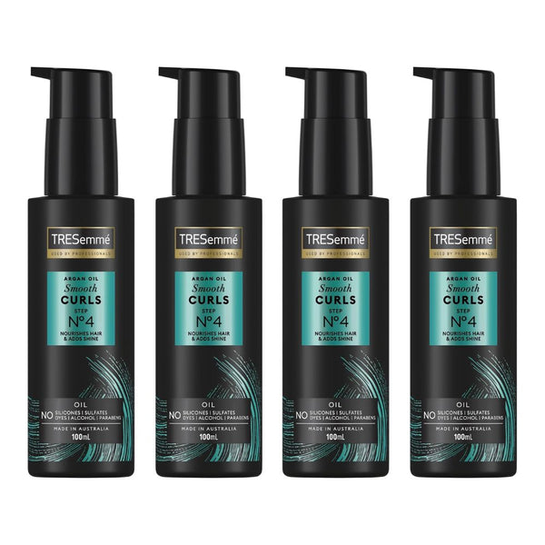Four bottles of Tresemme Argan Oil Smooth Curls hair product on a white background